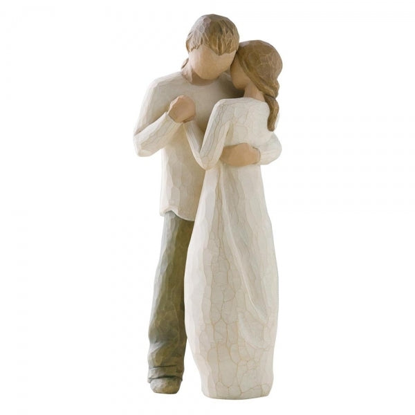 Promise by Willow Tree. Figure of standing couple embracing or dancing. Woman in cream dress, man in cream shirt and dark pants