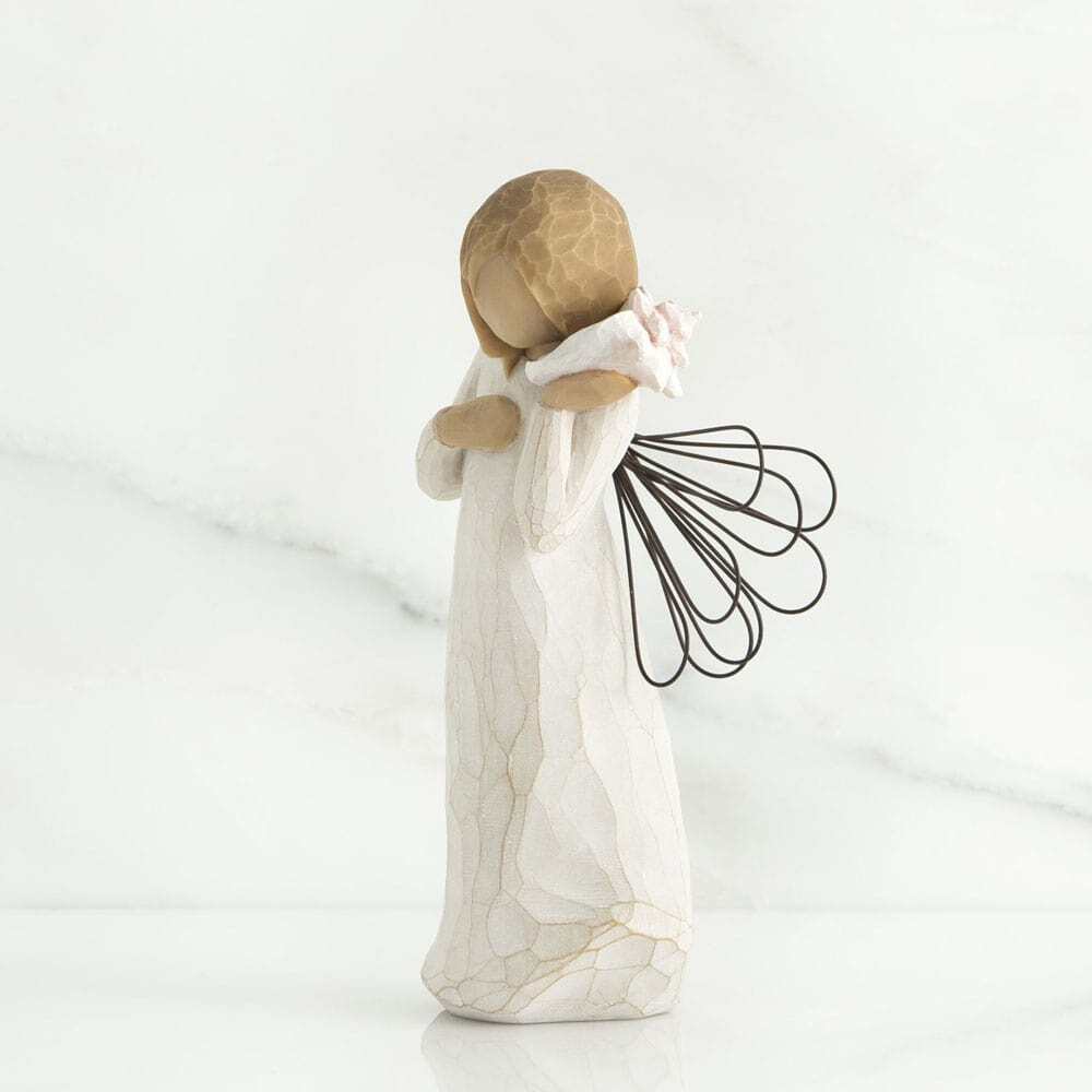 Thinking of You Angel by Willow Tree. Standing angel in cream dress with wire wings, holding pink conch shell to ear