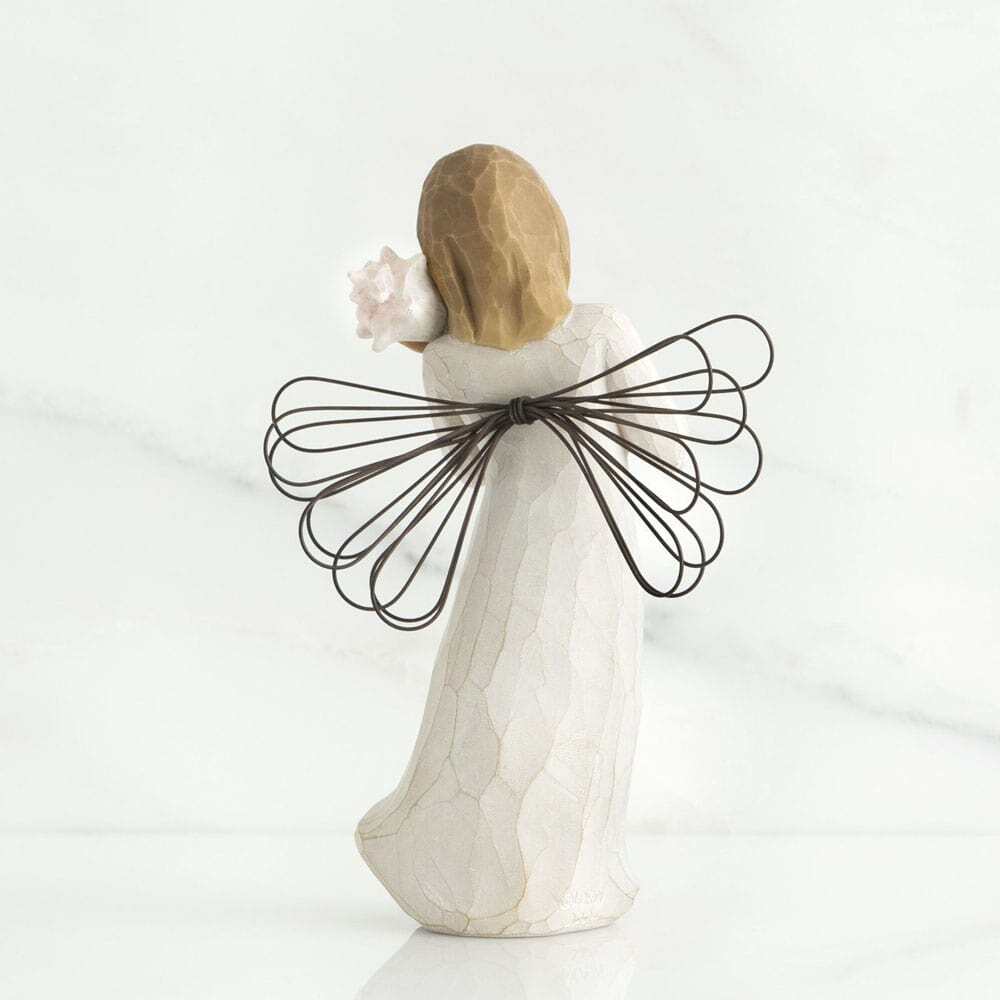 Thinking of You Angel by Willow Tree. Back View -  Standing angel in cream dress with wire wings, holding pink conch shell to ear