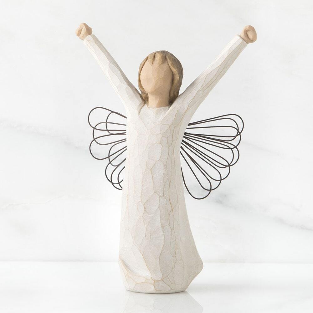 Standing angel in cream dress with wire wings, with both arms upraised