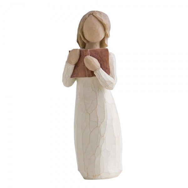 Love of Learning by Willow Tree. Standing figure in cream dress holding open book to her chest