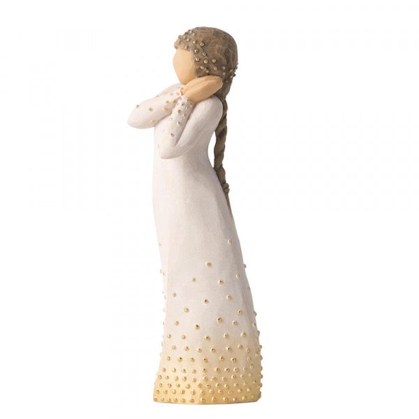 Standing figure in cream dress, holding up arms to face in wistful gesture. Bottom of dress embellished with gold and gold-leaf dots
