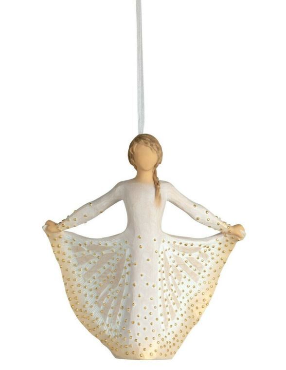 Butterfly Ornament by Willow Tree. Figure in cream dress, holding sides of her skirt out with both hands. Skirt has carved markings of a monarch butterfly, dotted with gold leaf. Hook and loop affixed to figure's head