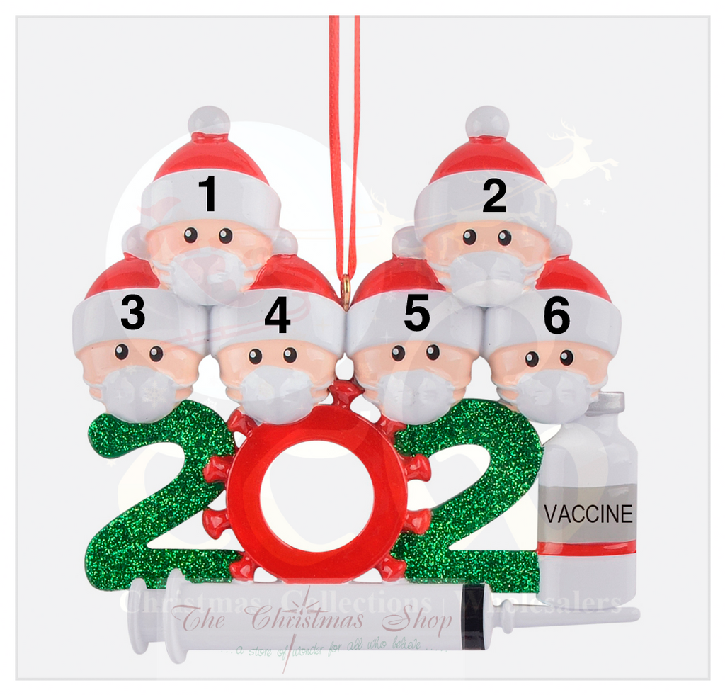 This ornament shows a family of 6 wearing masks with a vaccination vial and syringe.